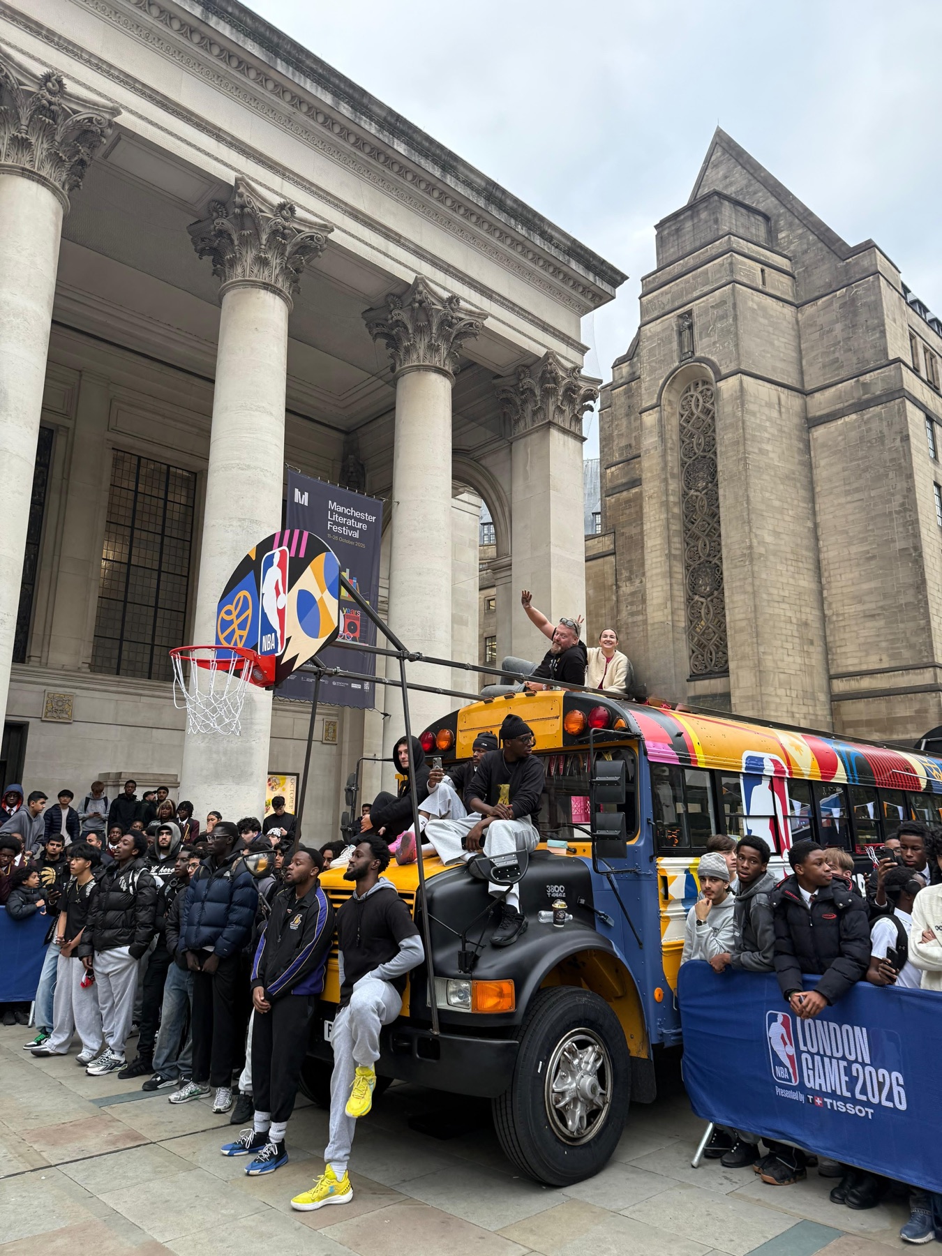 The STREETBUS surrounded by a crowd at a city event